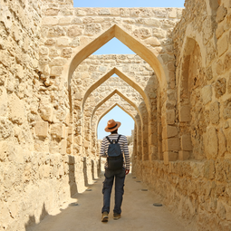 Man Walking in Bahrain Fort